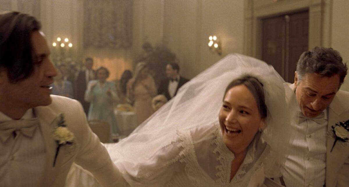 Edgar Ramirez, left, Jennifer Lawrence and Robert De Niro star in "Joy."