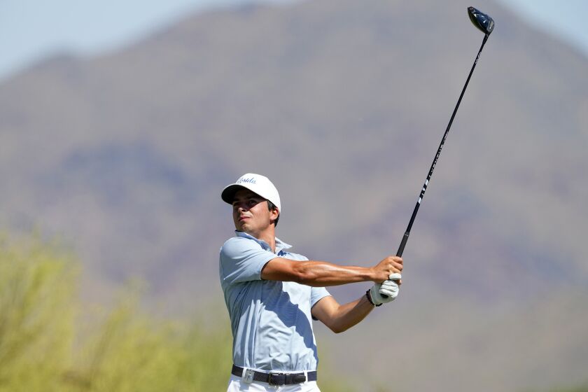Florida golfer Fred Biondi hits from the third tee during the final round of the NCAA college men's match play golf championship, Wednesday, May 31, 2023, in Scottsdale, Ariz. (AP Photo/Matt York)
