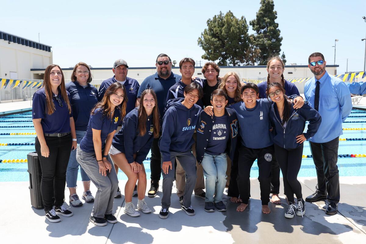Students and coaches of the Marina High aquatics program at Wednesday's ribbon-cutting ceremony for the new pool.
