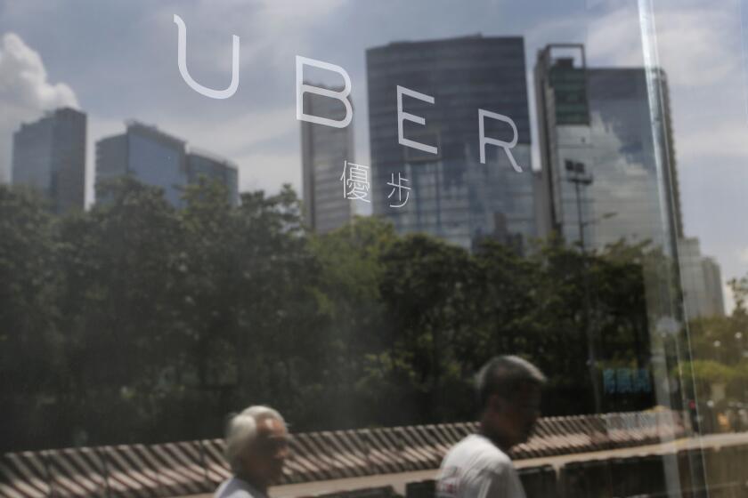 Companies such as ride-hailing app Uber raised more than $1 billion. Above, the start-up's office in Hong Kong.