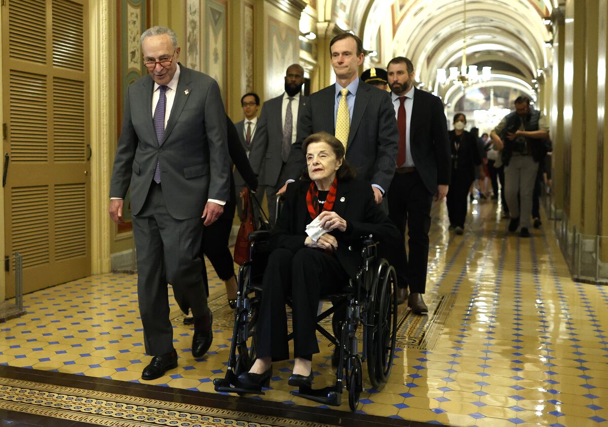 Sen. Dianne Feinstein arrives at the U.S. Capitol in a wheelchair 
