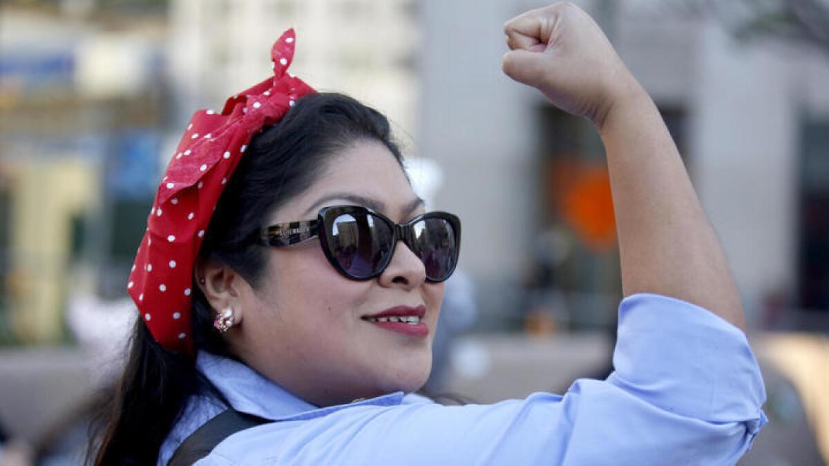 Sandra Santiago at the women's march in Los Angeles. March organizers are urging women to stay home from work on International Women's Day, which they've dubbed "A Day Without a Woman."