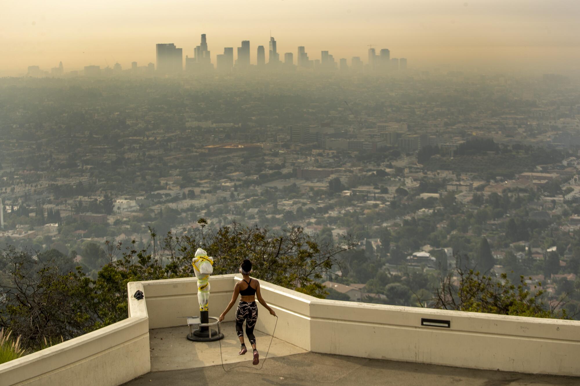 Carmen Green jumps rope at a closed Griffith Observatory.