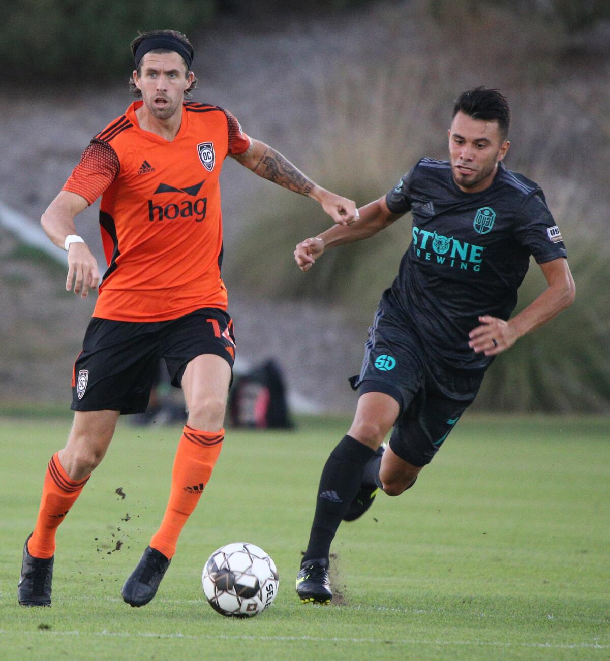 Orange County Soccer Club midfielder Aodhan Quinn looks to pass in a home game versus the San Diego Loyal on Saturday.