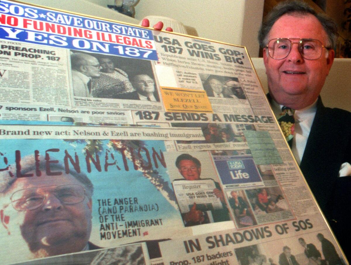 Harold Ezell with a collage of newspaper clippings about Proposition 187.