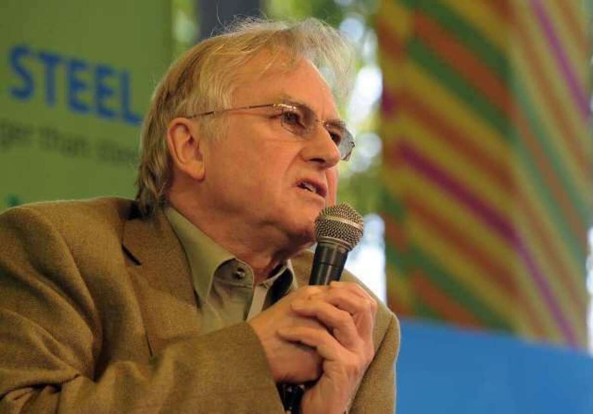 Richard Dawkins, seen here speaking during the Jaipur Literature Festival on Jan. 24, coined the term "meme" for the way evolutionary principles can be used to explain how cultural ideas take hold.