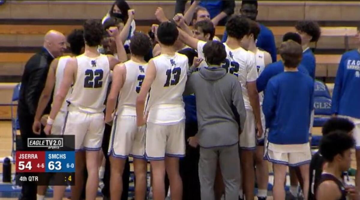 Santa Margarita boys' basketball team huddles on the sideline