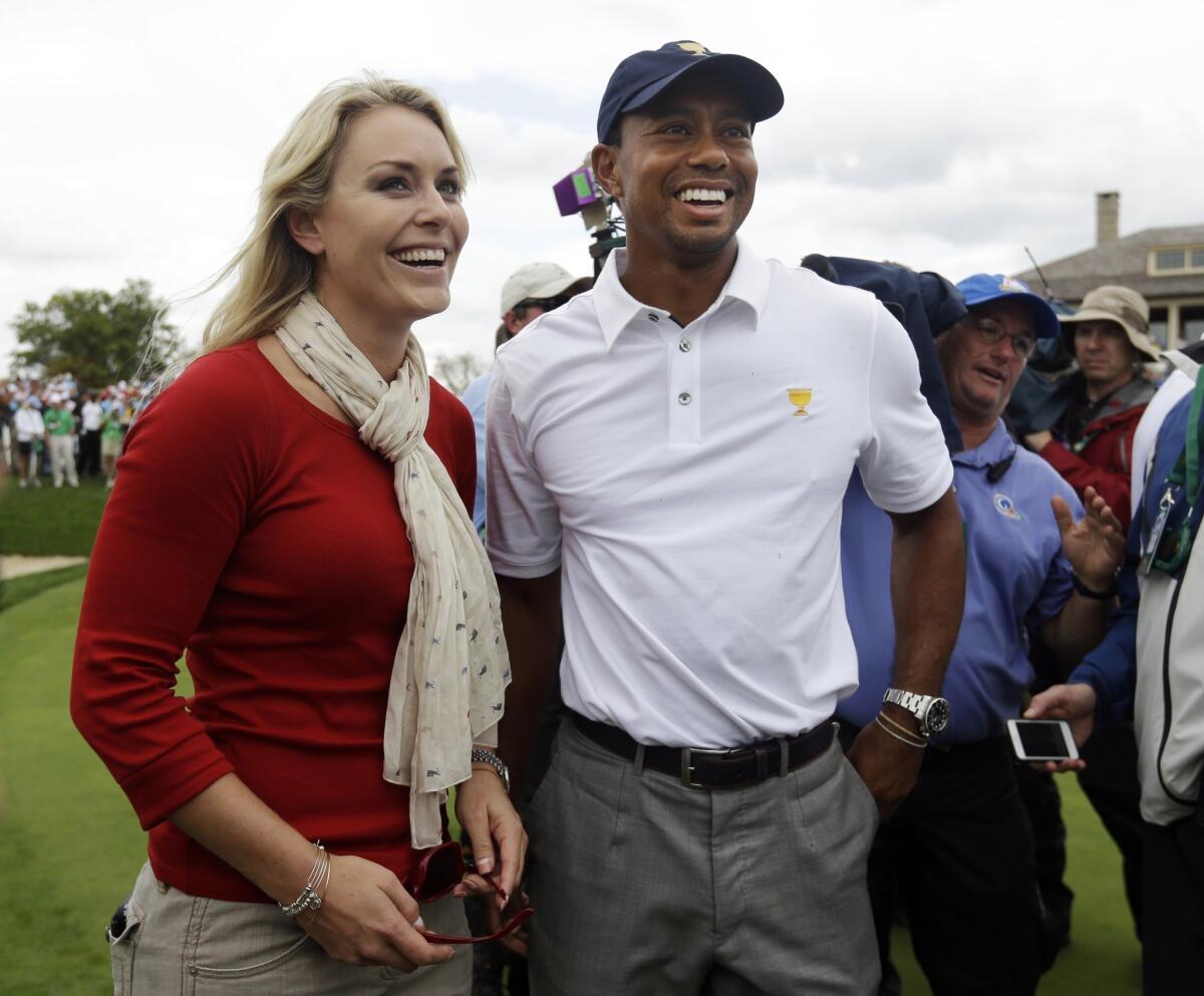 Tiger Woods and Lindsey Vonn after he helped the U.S. win the Presidents Cup at Muirfield Village Golf Club on Oct. 6.