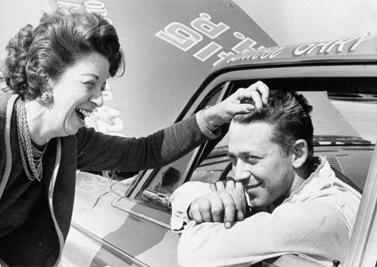 Mrs. Tony Bettenhausen tousles the hair of her son, Gary, in 1963. Gary Bettenhausen died Monday, racing officials said.