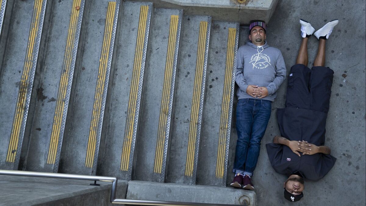 Thes One (Chris Portugal), left, and Double K (Michael Turner) of the longtime L.A. hip-hop act People Under the Stairs.