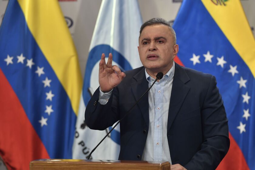 Venezuelan Attorney General Tarek William Saab holds a news conference about corruption cases with the state run oil company, PDVSA, in Caracas, Venezuela, Saturday, March 25, 2023. VVenezuela's oil czar, Tareck El Aissami, who announced his resignation on Twitter on Monday, March 20, 2023, pledged to help investigate any allegations involving PDVSA. (AP Photo/Matias Delacroix)