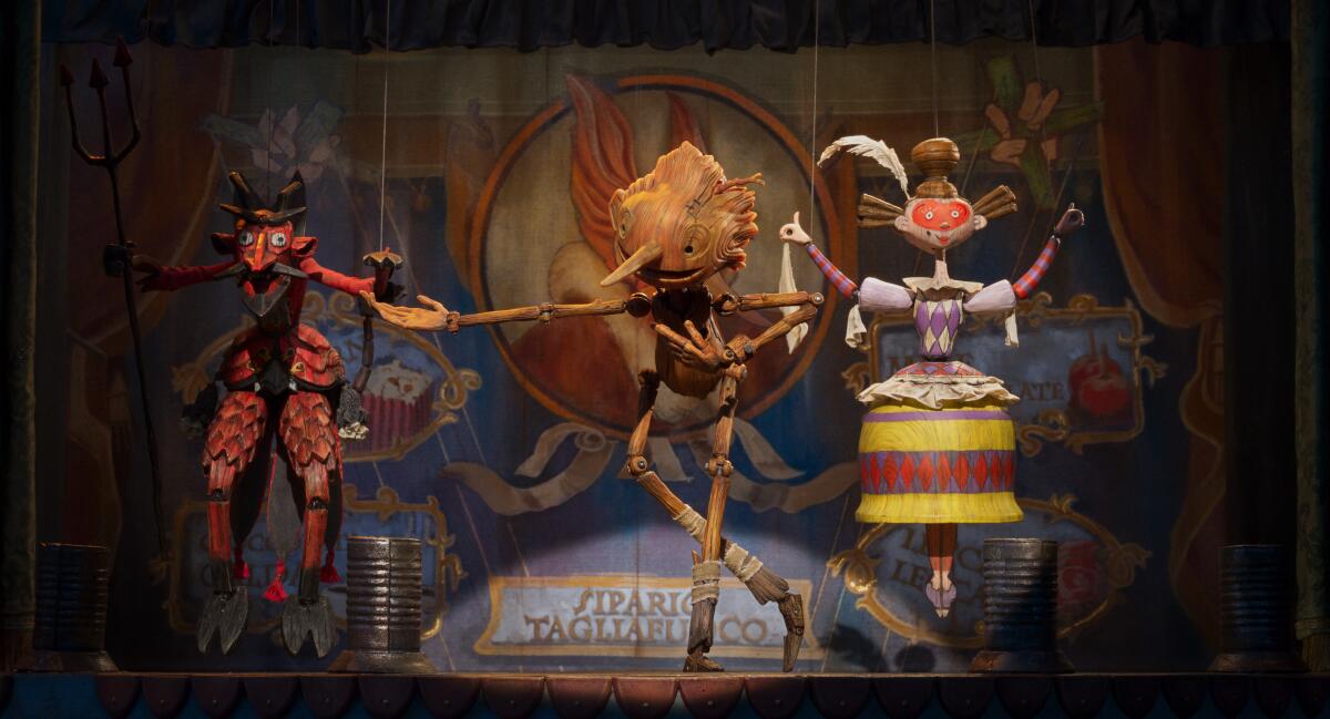 Puppets perform on stage in the stop-motion "Guillermo del Toro's Pinocchio."