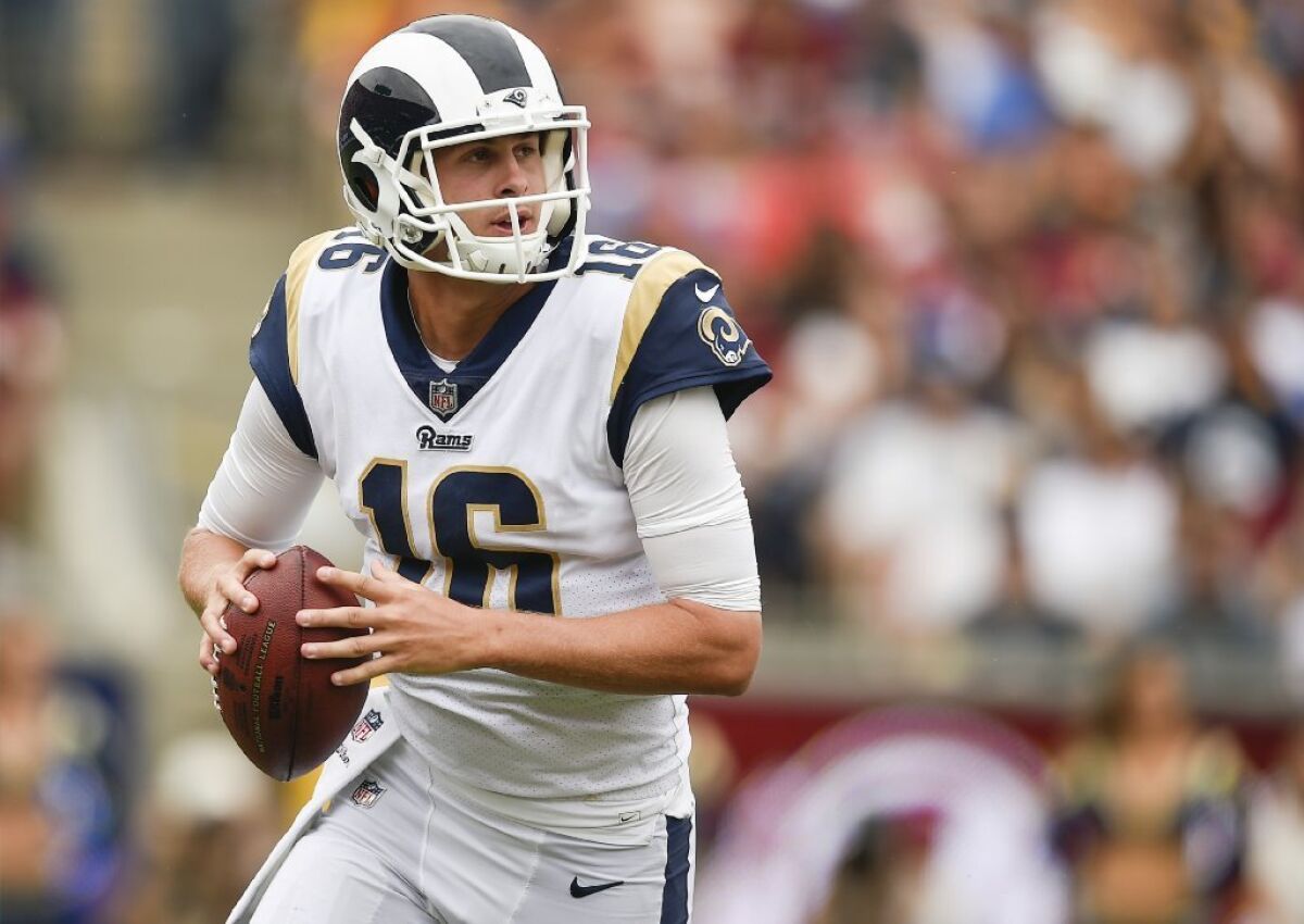 Rams quarterback Jared Goff looks to pass during a game against the Redskins at the Coliseum on Sept. 17.