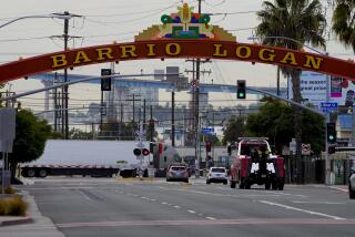 AN DIEGO, CA - DECEMBER 08: Large semi trucks hauling goods, drive along Harbor Drive and Cesar E. Chavez Parkway in Barrio Logan on Tuesday, Dec. 8, 2020 in San Diego, CA. The Port of San Diego will consider approving a new tenant, a cement warehouse, at its Tenth Avenue Marine Terminal in Barrio Logan. Local health and environmental advocates are pushing back against the new tenant because they say it will triple the amount of diesel trucks that drive through the community of Barrio Logan. Advocates want the Port to demand that a certain percentage of semi-trucks be electric. (Nelvin C. Cepeda / The San Diego Union-Tribune)