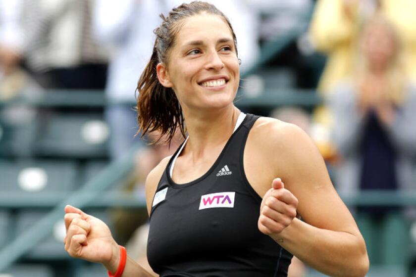 Andrea Petkovic reacts after defeating Jana Cepelova for the Family Circle Cup tennis title on Sunday.