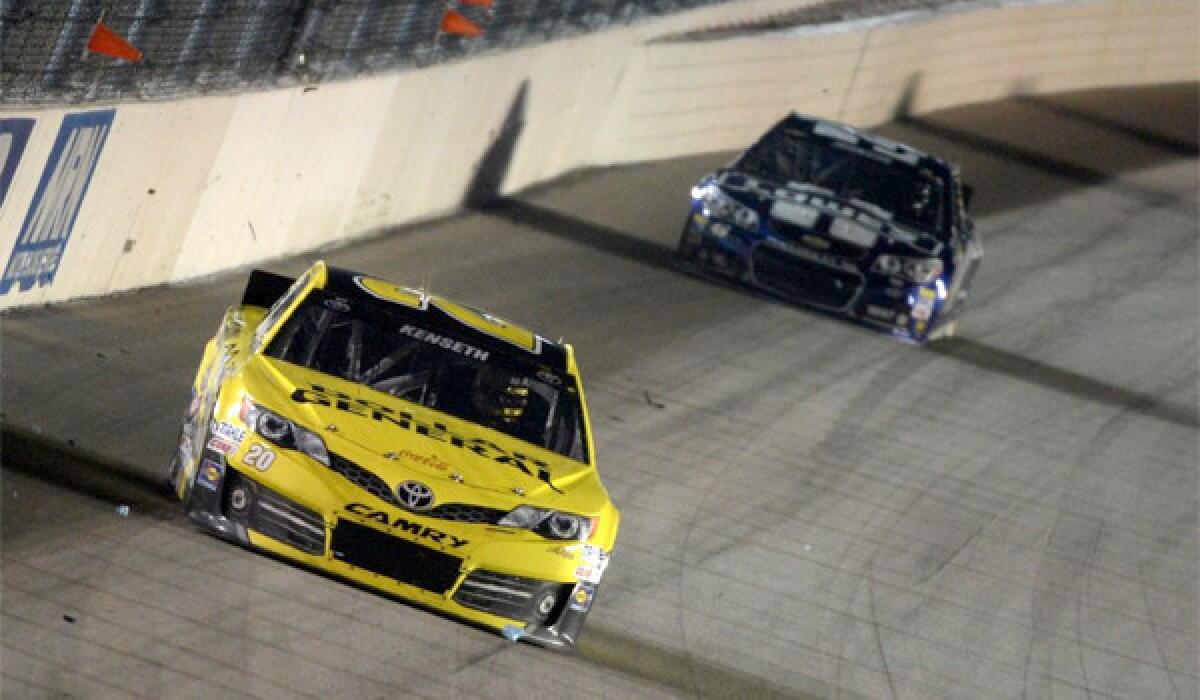 Matt Kenseth was victorious at the Geico 400 at Chicagoland Speedway on Sunday after rain delayed the first Chase for the Sprint Cup race for more than six hours between two rain delays.