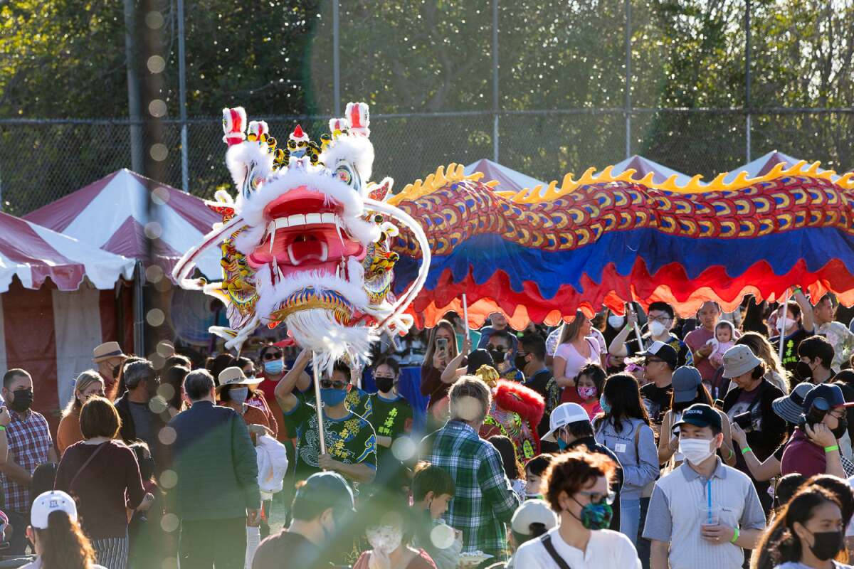 Members of the Southern Sea Lion and Dragon Dance troupe perform at the San Diego Tet Festival in Mira Mesa in 2022.