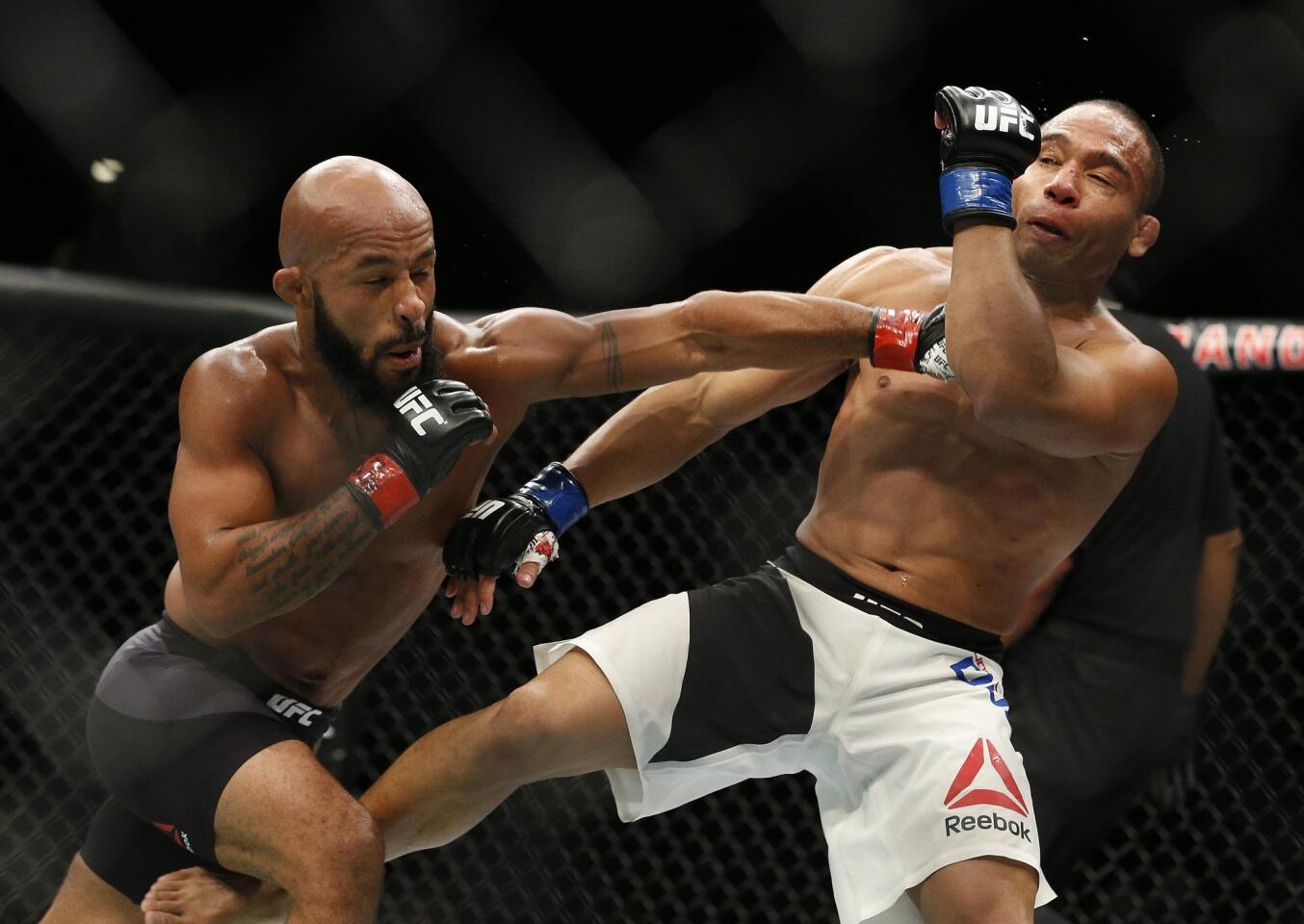 Demetrius Johnson, left, defeated John Dodson by unanimous decision Saturday at UFC 191 at Las Vegas.