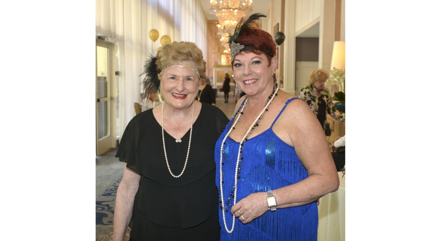 Over 300 guild members and supporters where welcomed to last week's "Puttin' on the Ritz" fashion show and luncheon by chairwoman Kathleen Marsden, left, and guild President Julie McArdle.