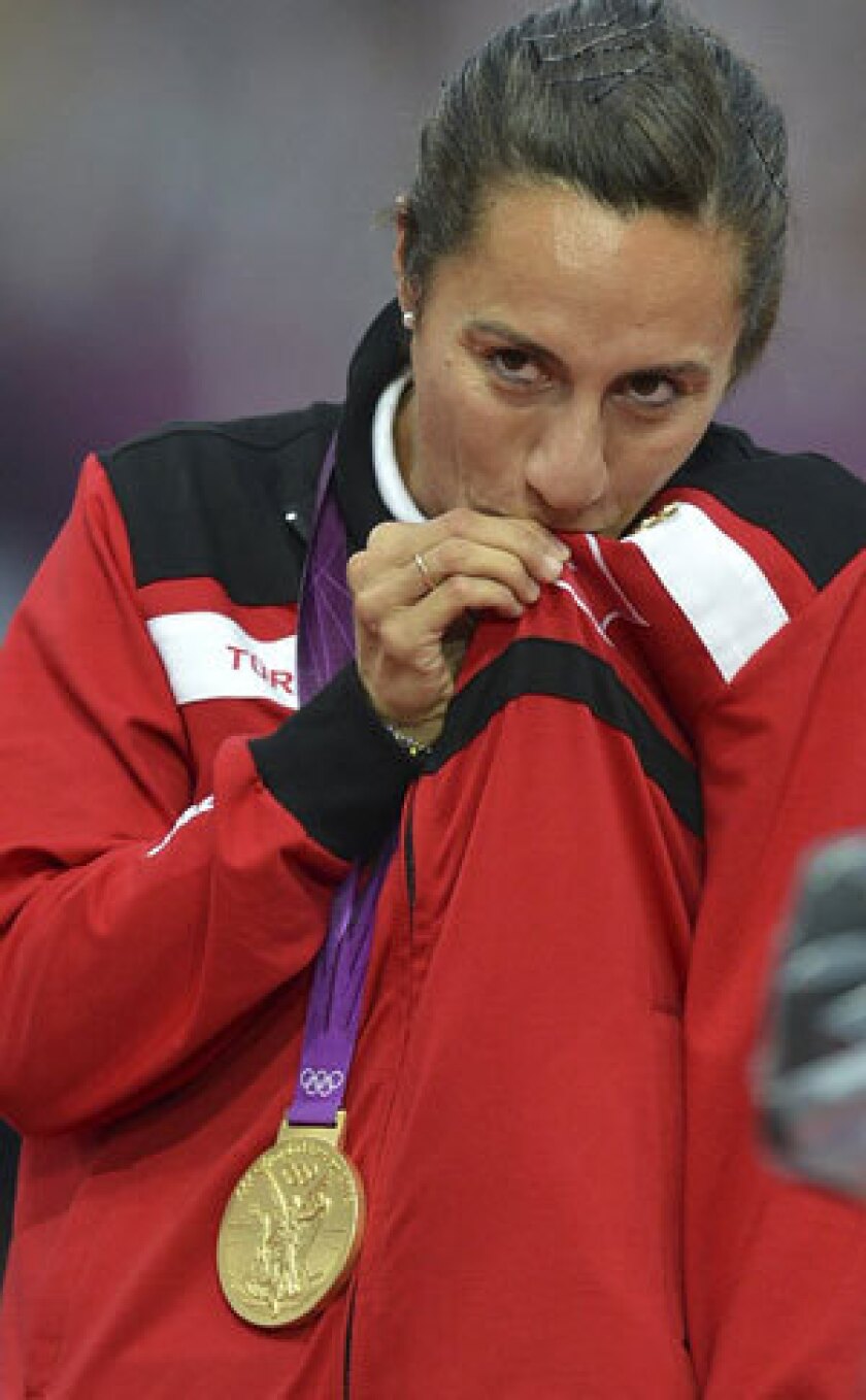 Asli Cakir Alptekin, a gold medalist at the 2012 London Games, heads a list of Turkish athletes who have recently been charged with doping.