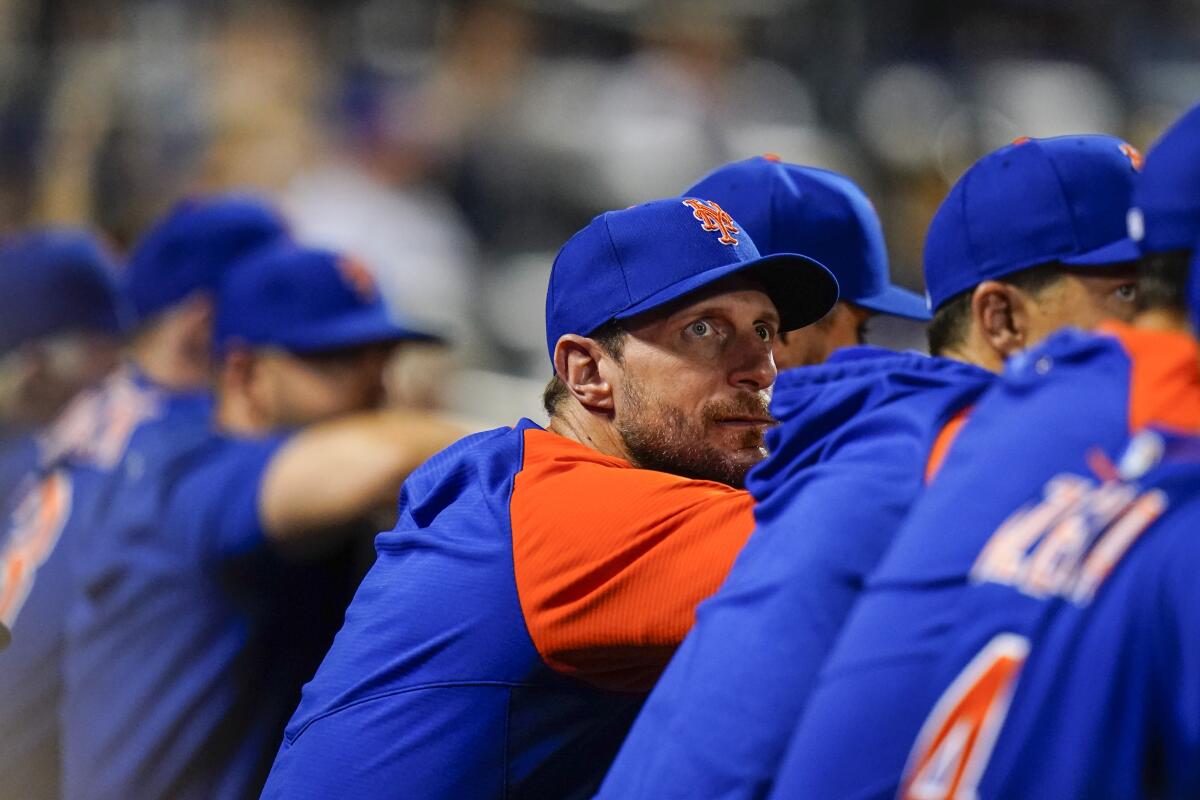 New York Mets pitcher Max Scherzer watches during the eighth inning of a baseball game against the Milwaukee Brewers, Tuesday, June 14, 2022, in New York. (AP Photo/Frank Franklin II)