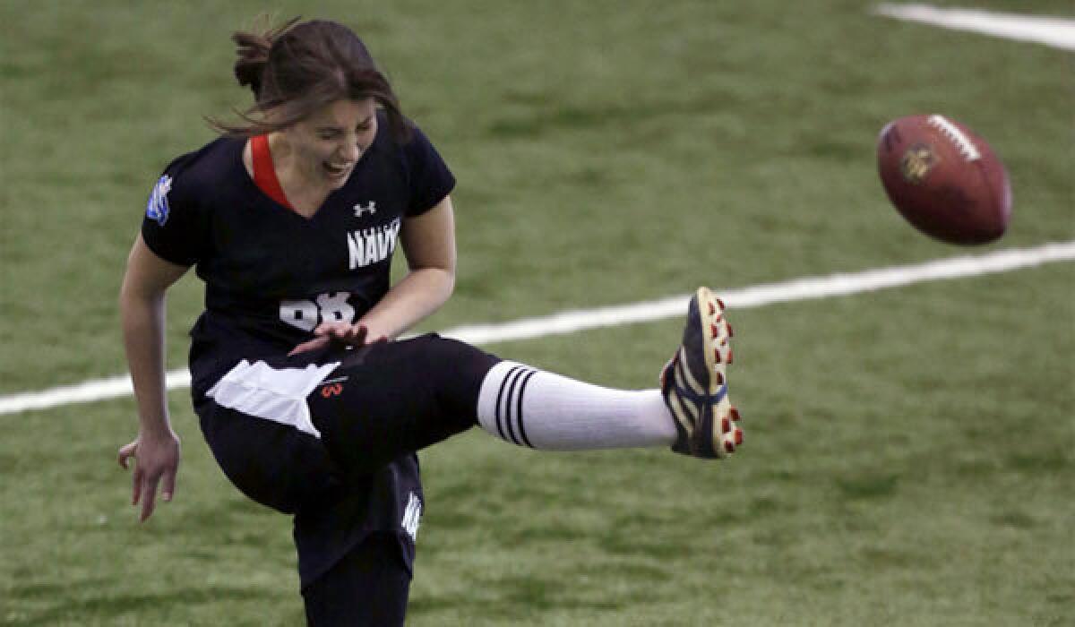 Lauren Silberman winces in pain during one of her two kicks at an NFL regional combine.