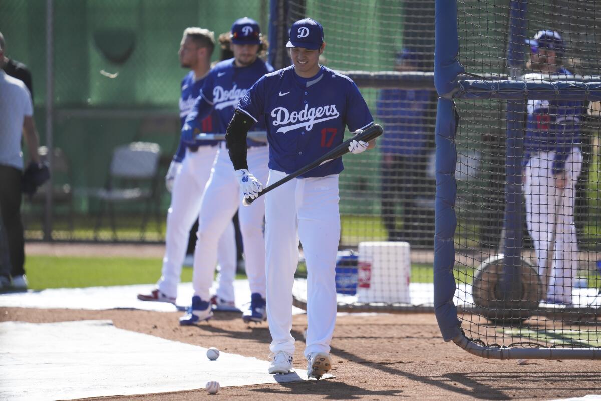 Dodgers DH Shohei Ohtani (17) participates in batting practice at spring training at Camelback Ranch in Phoenix on Feb. 14.