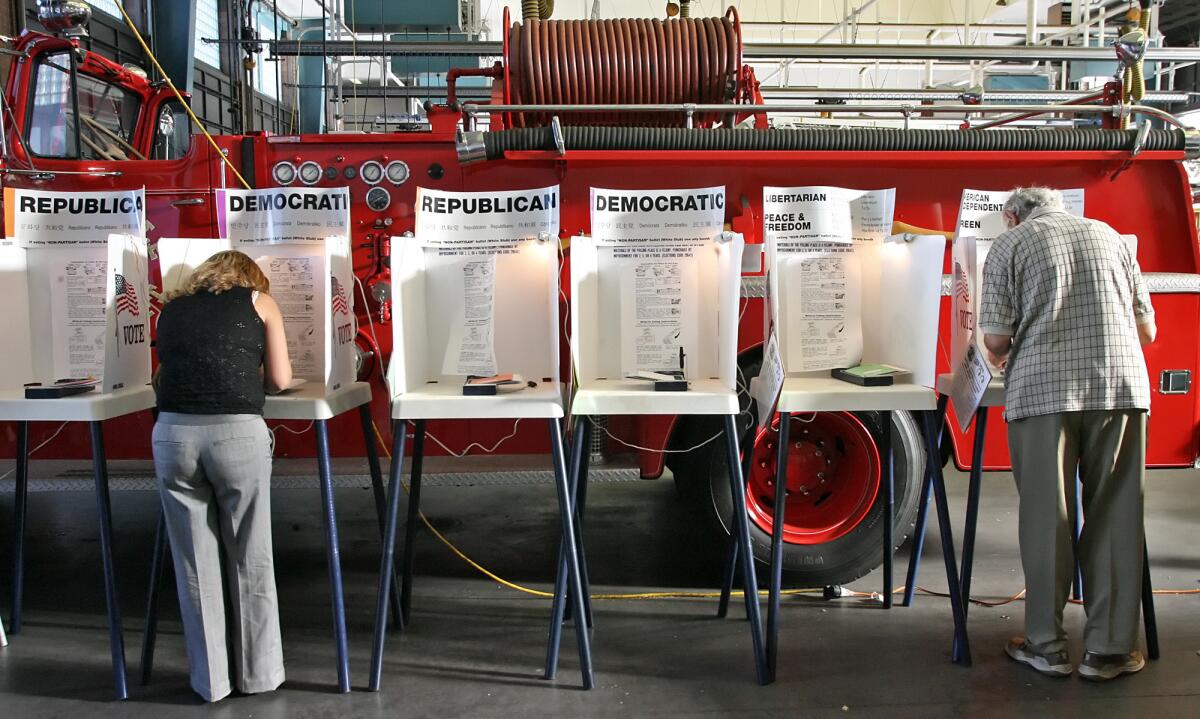 Residents fill out their ballots at Glendale Fire Station 21 on Monday, June 8, 2010.