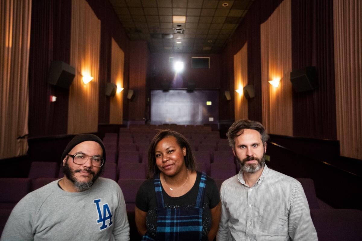 Co-owners Luis Orellana, from left, Lauren Brown and Peter Ambrosio, in the Lumiere Cinema at the Music Hall in Beverly Hills.