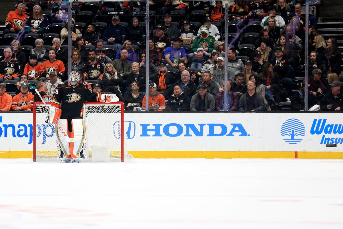 Ducks' John Gibson looks on after allowing a goal during the first period against the Calgary Flames at Honda Center on Feb. 12.