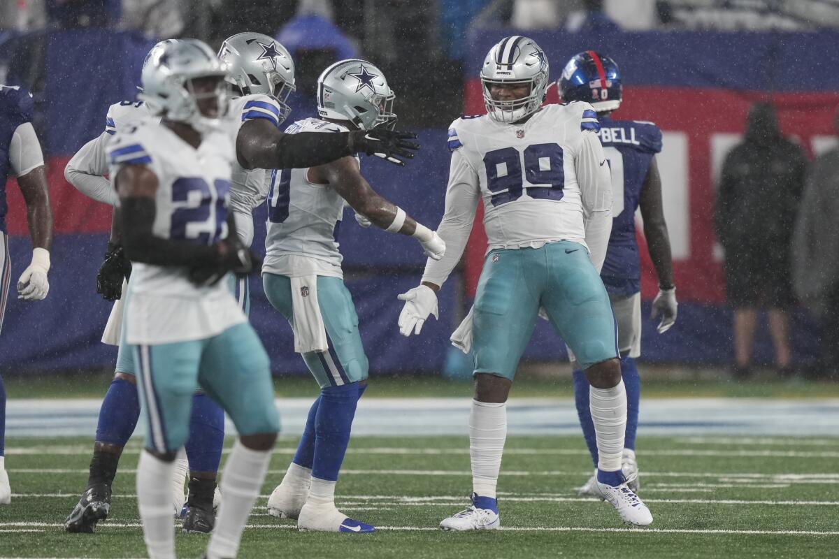 Cowboys score early on defense and special teams, embarrass Giants 40-0 at  Meadowlands - The San Diego Union-Tribune
