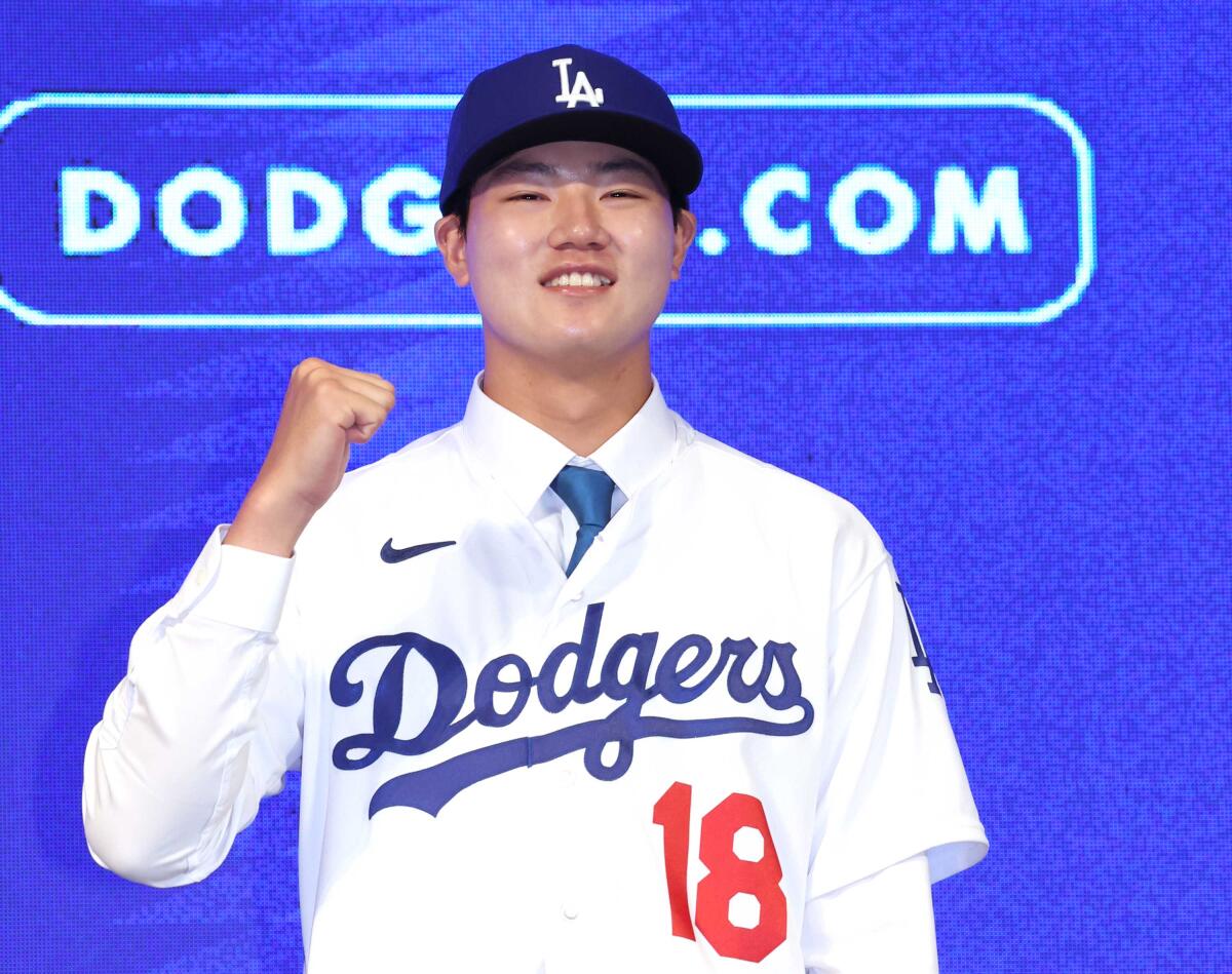 South Korean high school pitcher Jang Hyun-seok poses in his Los Angeles Dodgers jersey.