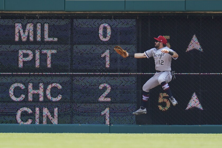 Chicago White Sox right fielder Adam Eaton catches a Detroit Tigers' Eric Haase fly ball in the third inning of a baseball game in Detroit, Sunday, July 4, 2021. (AP Photo/Paul Sancya)