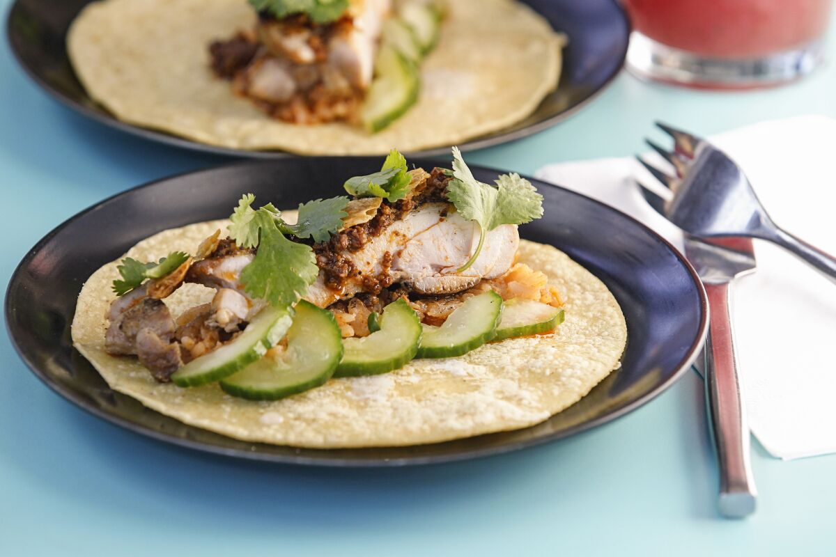 Mesquite Chicken tacos made by Lola 55 executive chef Andrew Bent on November 7, 2019 in San Diego, California.