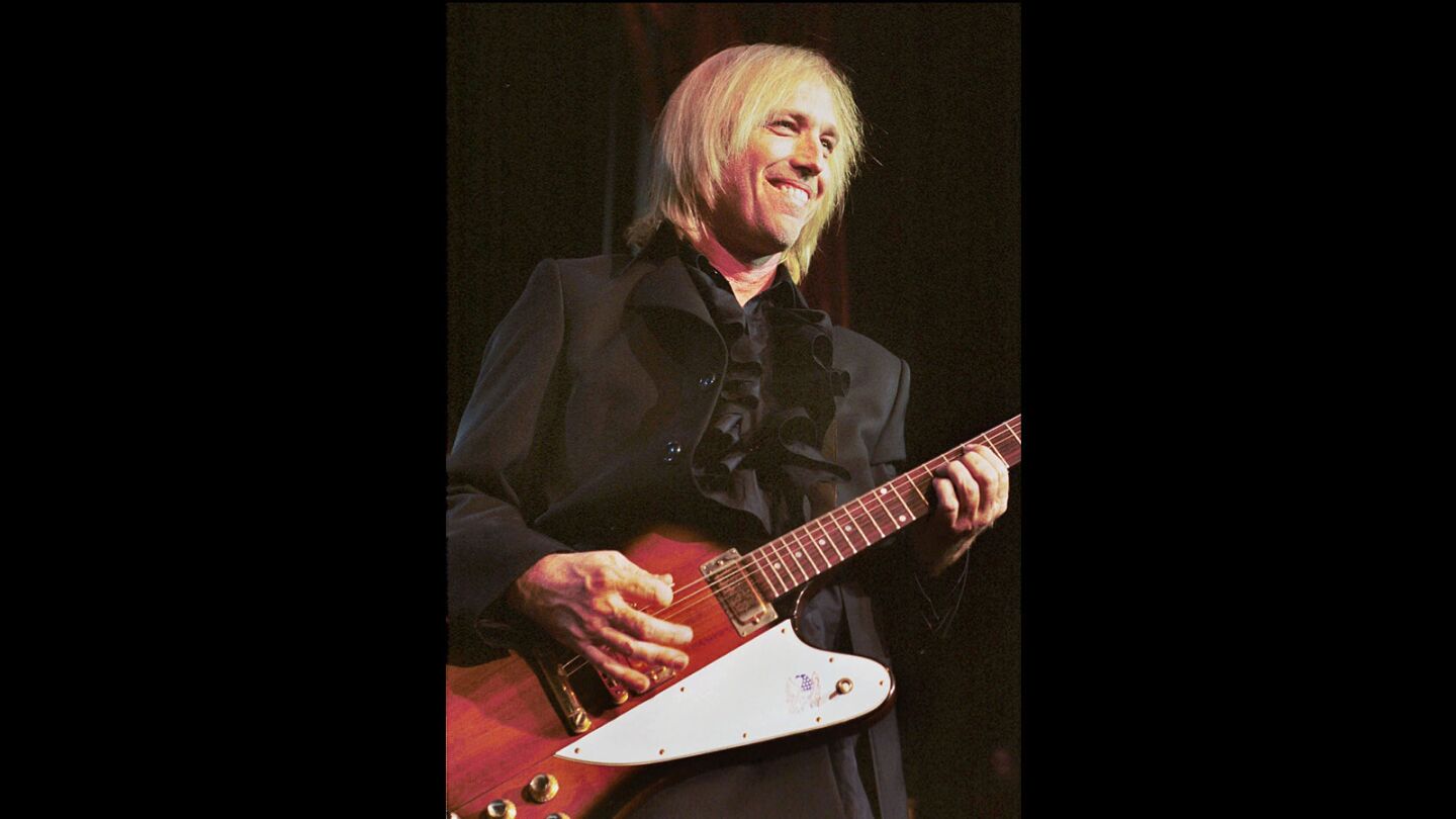 Tom Petty and the Heartbreakers perform at Pine Knob Music Theater in Clarkston, Mich., on June 18, 1999.
