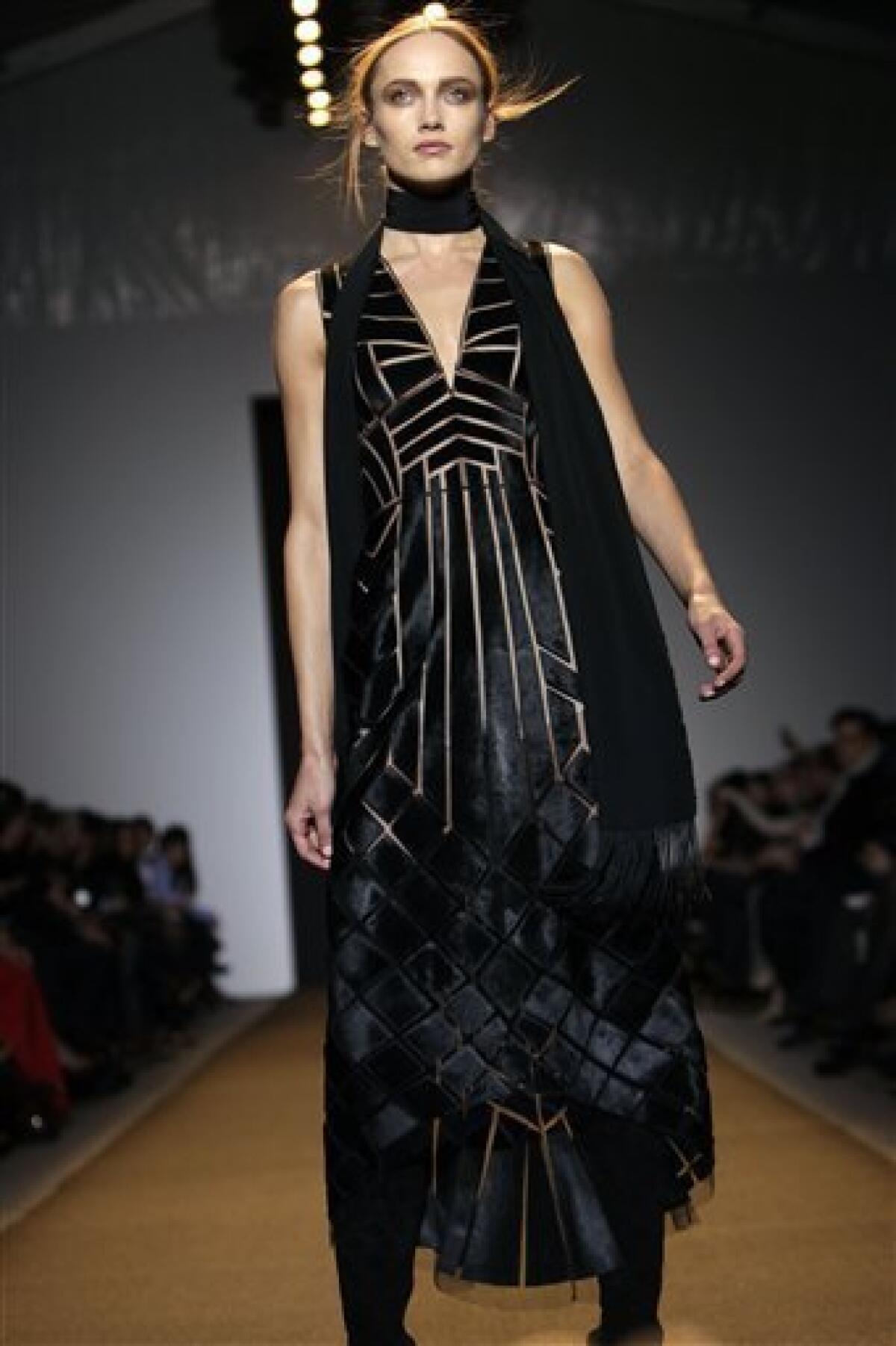 Fall 2011 fashion from J. Mendel is modeled during Fashion Week in New York, Tuesday, Feb. 15, 2011. (AP Photo/Seth Wenig)