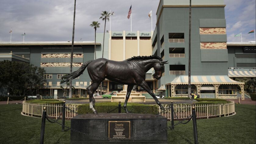 A statue of Zenyatta stands in the paddock gardens area of Santa Anita Park in Arcadia, Calif., on March 5.