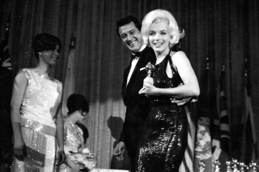 Actress Marilyn Monroe attends the Golden Globe Awards in 1962