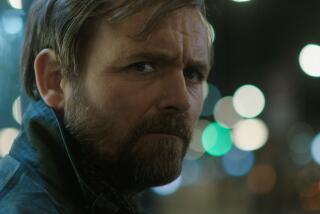 A man with a beard in the movie "Bull."