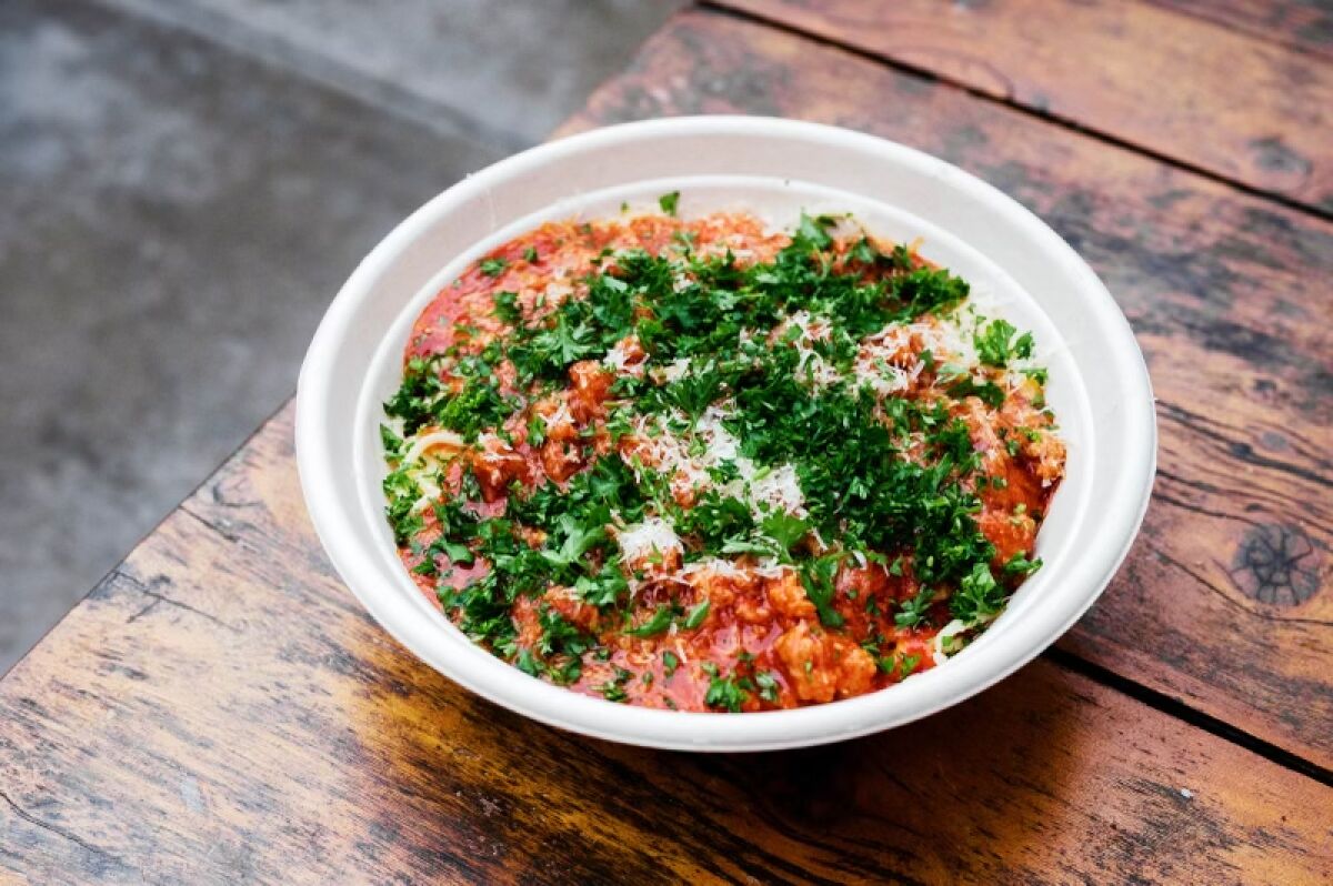 Filipino spaghetti is one of the dishes at the new White Rice restaurant at Liberty Public Market at Liberty Station.
