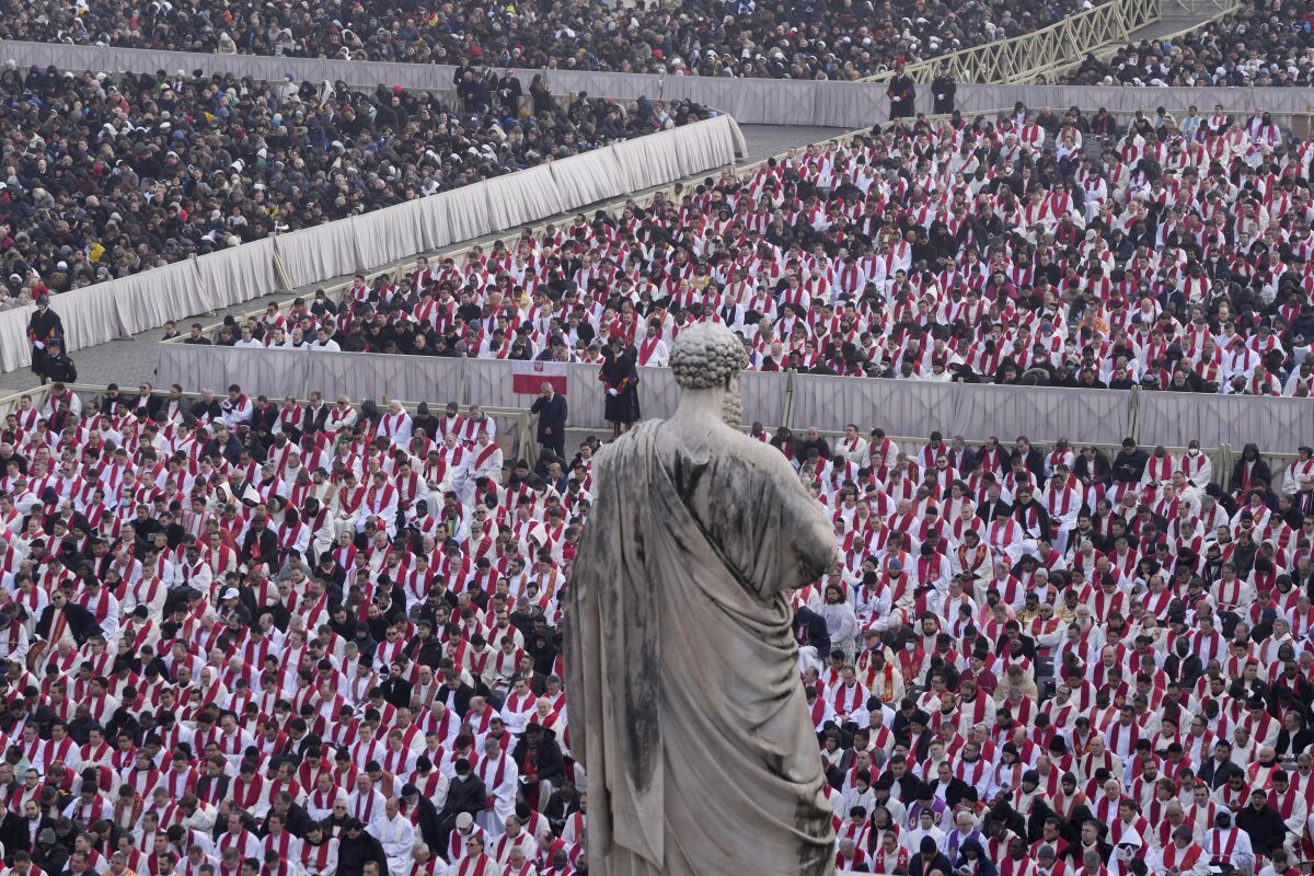 Thousands of people massed in St. Peter's Square at the Vatican 