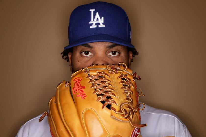 Los Angeles Dodgers' Kenley Jansen poses for a picture during the team's photo day Friday, Feb. 24, 2017, in Glendale, Ariz. (AP Photo/Morry Gash)
