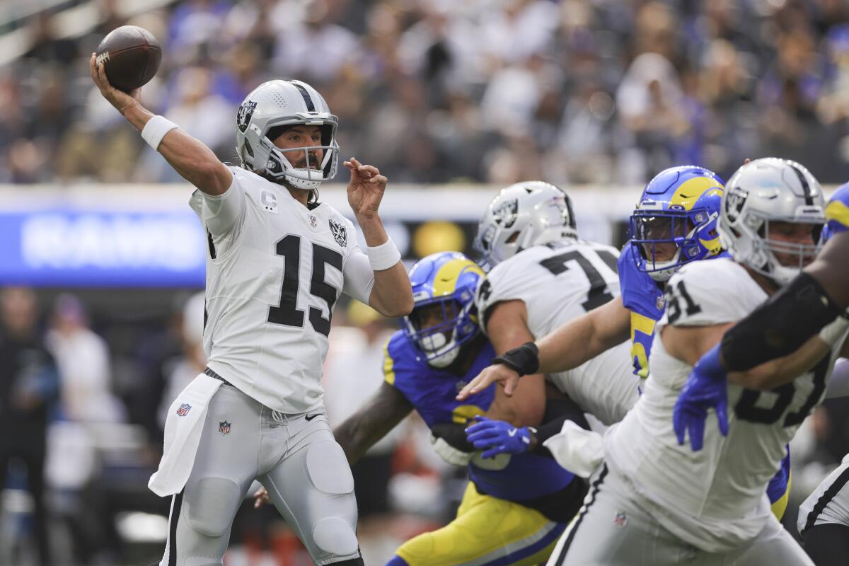 Raiders quarterback Gardner Minshew passes against the Rams in the first half Sunday.