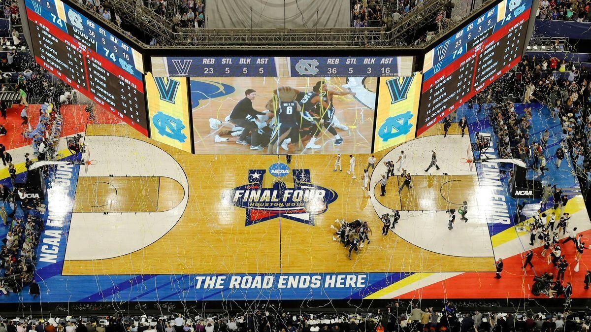 A bird's-eye view shows Villanova players celebrating on the court after beating North Carolina in the championship game of the NCAA tournament in Houston on Apr. 4, 2016.