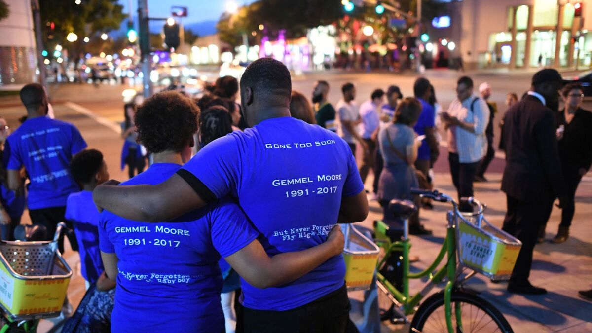 Friends, family and supporters gather in August 2017 for a vigil outside the West Hollywood sheriff's station in honor of Gemmel Moore, who was found dead of a drug overdose in the home of prominent Democratic donor Ed Buck days earlier.