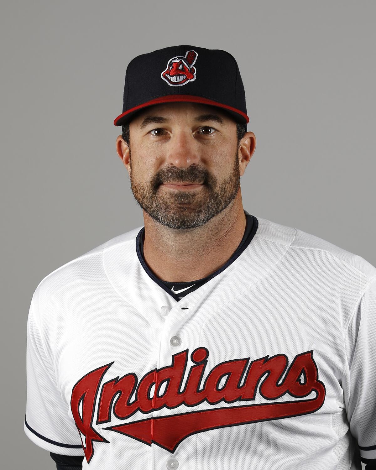 FILE - This is a 2016 file photo showing Mickey Callaway of the Cleveland Indians baseball team. Indians president of baseball operations Chris Antonetti said he couldn't comment on previous remarks made about Mickey Callaway's behavior due to Major League Baseball's ongoing investigation into allegations the team's former pitching coach sexually harassed women. Antonetti joined manager Terry Francona for his Zoom availability on Wednesday, March 3, 2021, a day after a story by The Athletic said several former Indians employees had come forward in the last month to say the team's front office was aware of Callaway's actions. (AP Photo/Morry Gash, File)