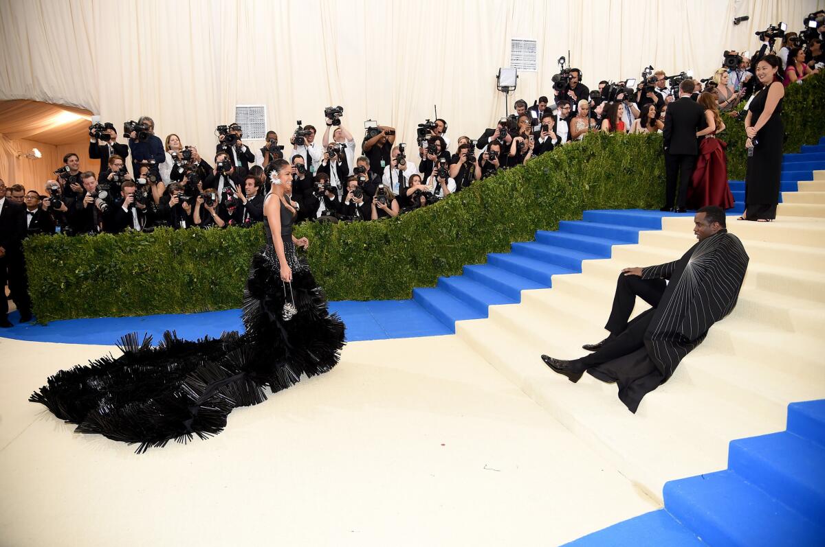 Cassie, left, and Sean "Diddy" Combs a.k.a. Puff Daddy hit the red carpet at the "Rei Kawakubo/Comme des Garcons: Art of the In-Between" Costume Institute Gala at Metropolitan Museum of Art on May 1 in New York.