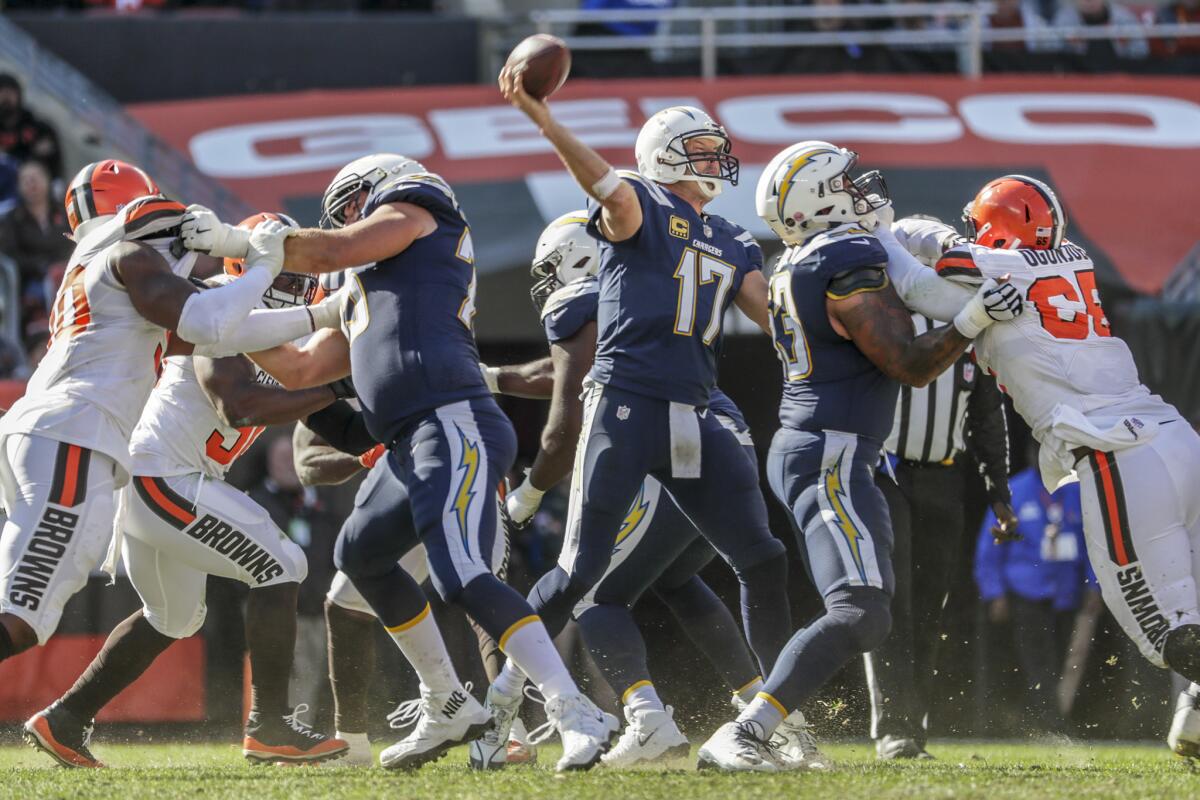 Chargers quarterback Philip Rivers delivers a pass from a clean pocket during a route of the Cleveland Browns at Firstenergy Stadium on Sunday.