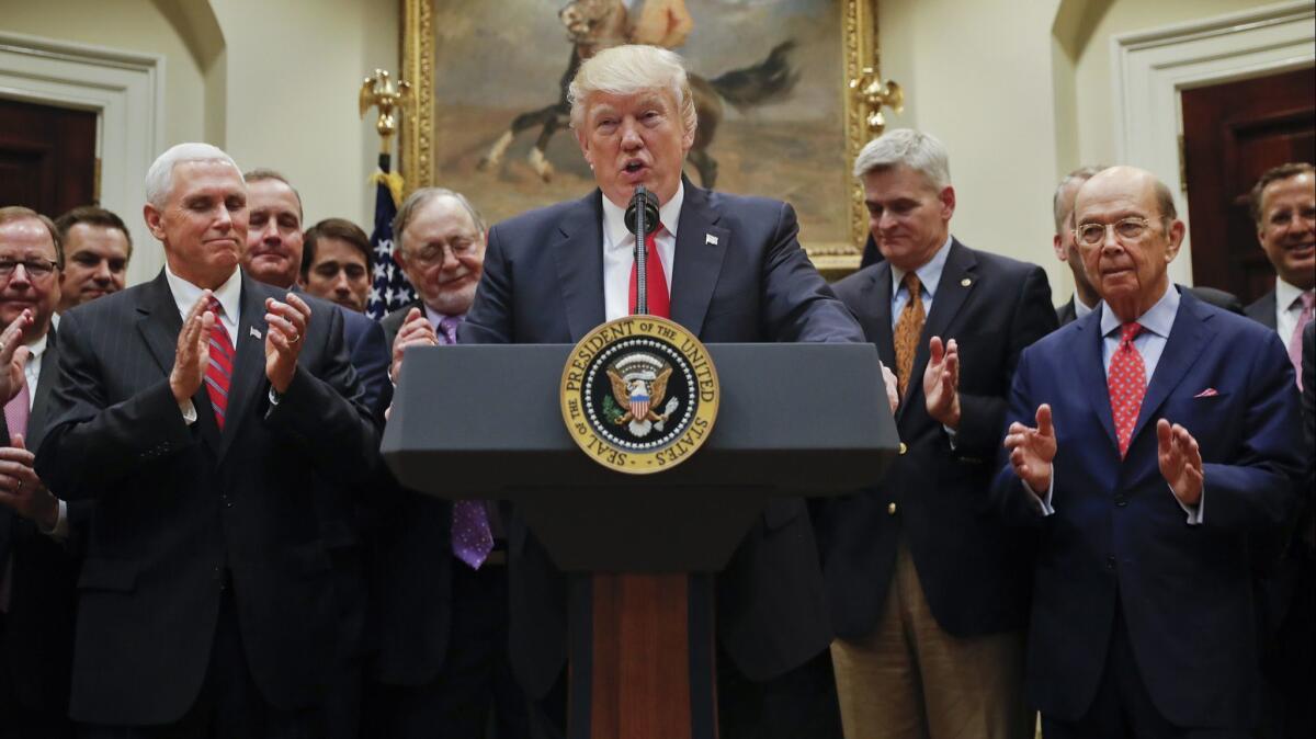 President Trump speaks in the Roosevelt Room of the White House in Washington on April 28, 2017, before signing an Executive Order directing the Interior Department to begin review of restrictive drilling policies for the outer-continental shelf.