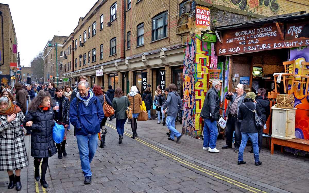 As the world visits London for the 2012 Olympics, visitors will encounter recent changes, including the revitalization of the East End. Its Brick Lane was once an industrial artery, then home to Bangladeshi immigrants and curry shops, and is now a favored haunt of bohemians and creative types. On Sundays, it fills with shoppers and browsers.